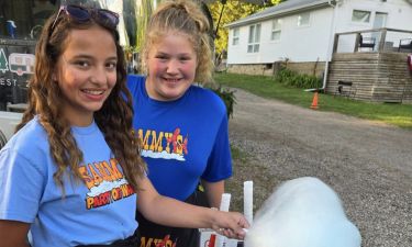 Cotton candy being made at an outdoor event