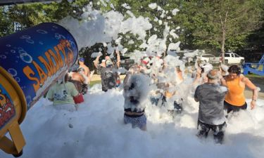 Foam cannon in action at a foam party