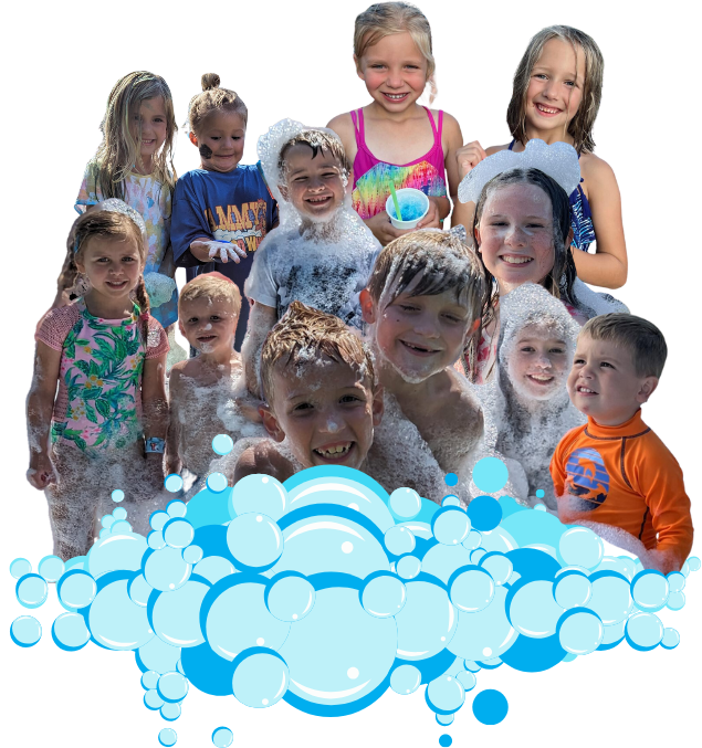 A joyful group of kids covered in foam at a birthday party, surrounded by colorful bubbles at a Sammy's Party on Wheels event in Grand Rapids, Michigan.